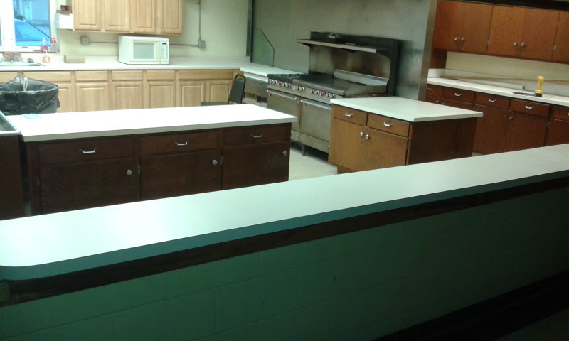 commercial kitchen countertops are resurfaced to a clean uniform look
