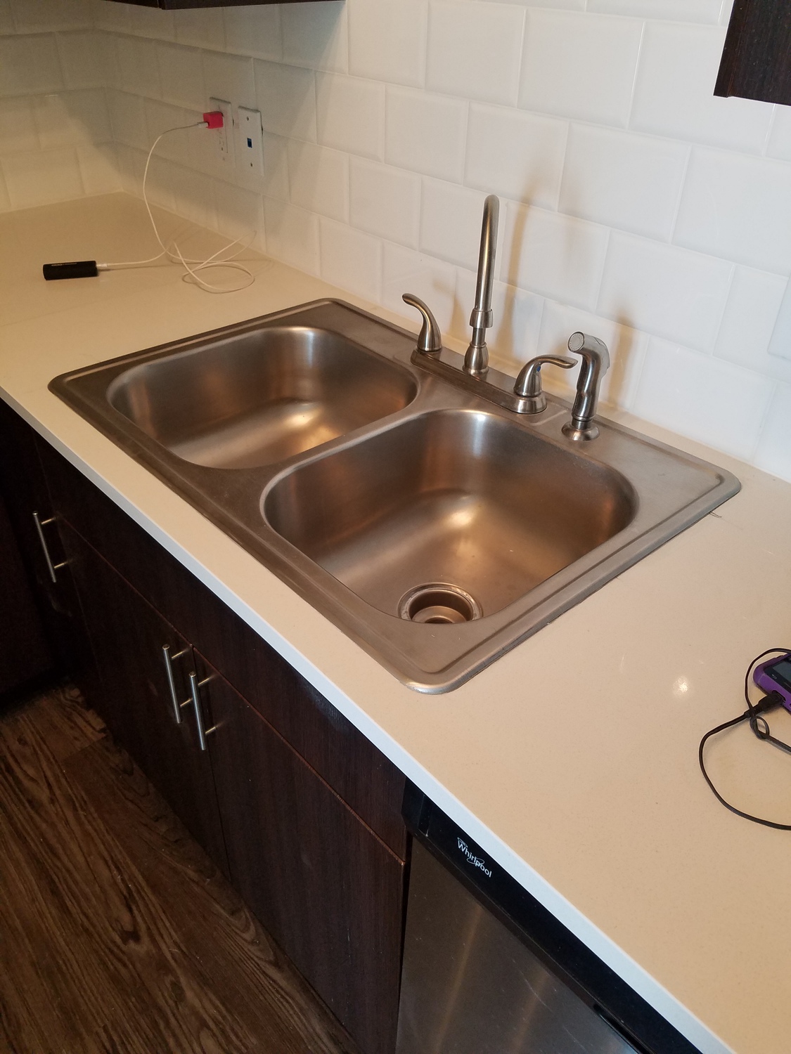 Polished out stainless steel kitchen sinks makes it look brand new again after construction work damage
